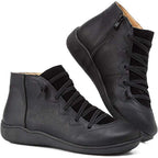 Women's ankle boots with a criss-cross lace detail and a side zip.