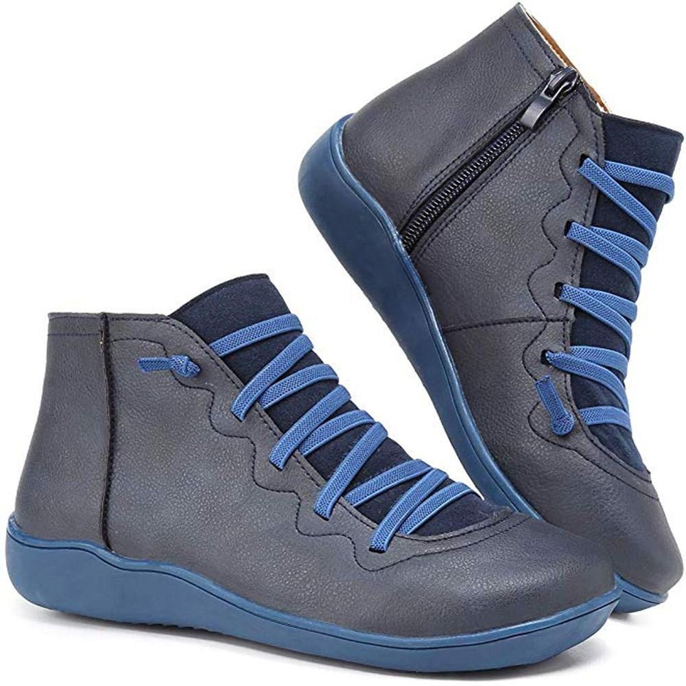 Women's ankle boots with a criss-cross lace detail and a side zip.