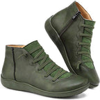 Women's ankle boots with a criss-cross lace detail and a side zip.