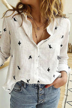 Flora cotton linen top in soft white, featuring a relaxed, casual style with a lightweight, breathable fabric. 0