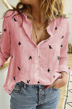 Flora cotton linen top in soft white, featuring a relaxed, casual style with a lightweight, breathable fabric. 2
