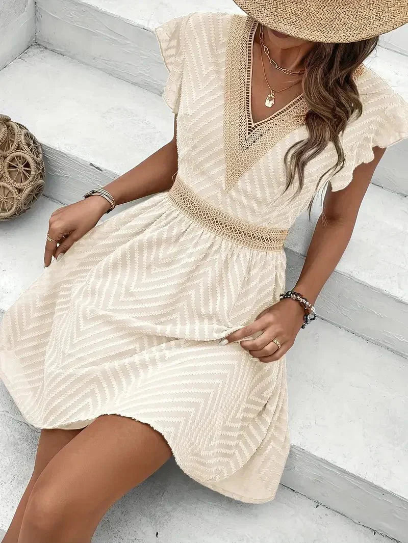 Light and airy white summer dress with a sweetheart neckline and flowy silhouette. 2