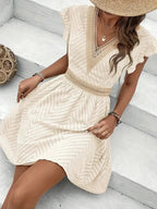 Light and airy white summer dress with a sweetheart neckline and flowy silhouette. 2