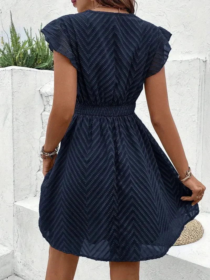 Light and airy white summer dress with a sweetheart neckline and flowy silhouette. 4