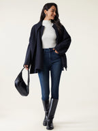 Hanneke oversized scarf coat in black navy, worn walking