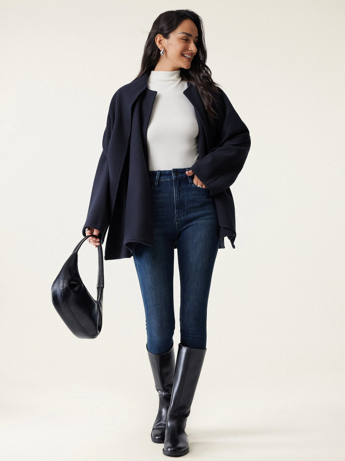 Hanneke oversized scarf coat in black navy, worn walking