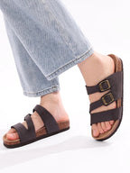 Hex Nappa leather slides in soft beige, featuring a minimalist design with a comfortable, casual style. 4