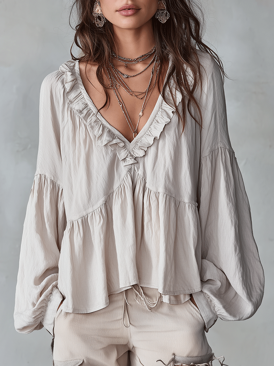 White vintage-inspired blouse with ruffles, perfect for summer. Lightweight and airy design. 0