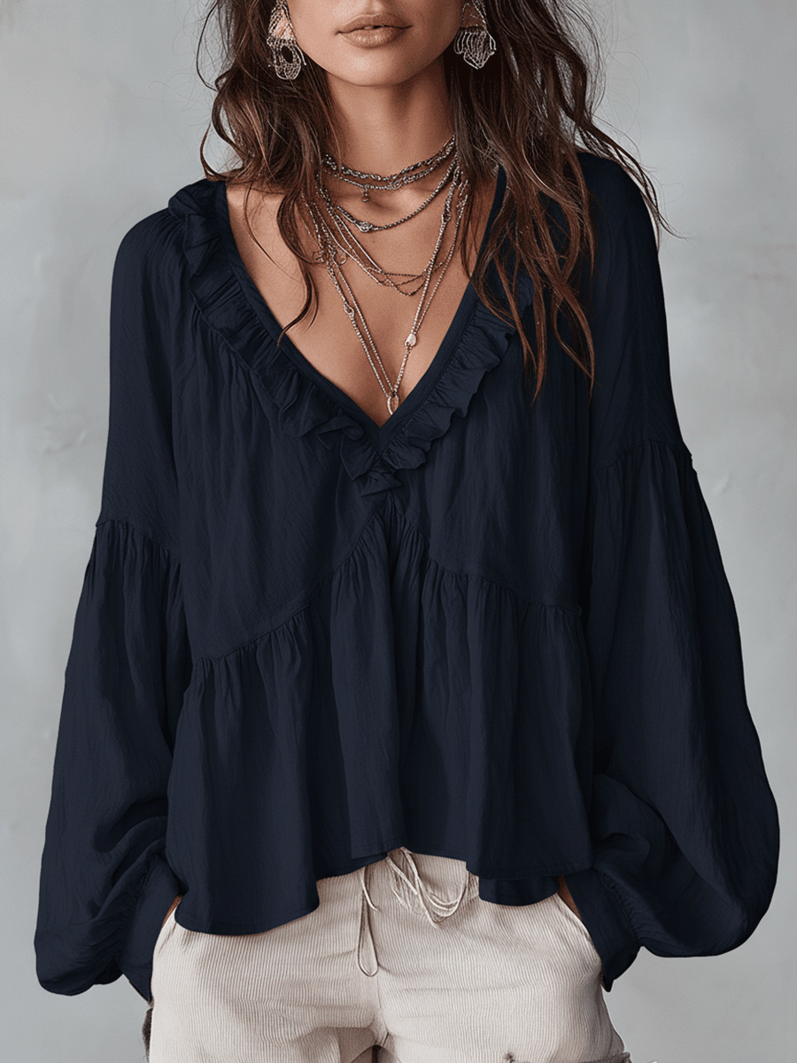 White vintage-inspired blouse with ruffles, perfect for summer. Lightweight and airy design. 4