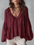 White vintage-inspired blouse with ruffles, perfect for summer. Lightweight and airy design. 7