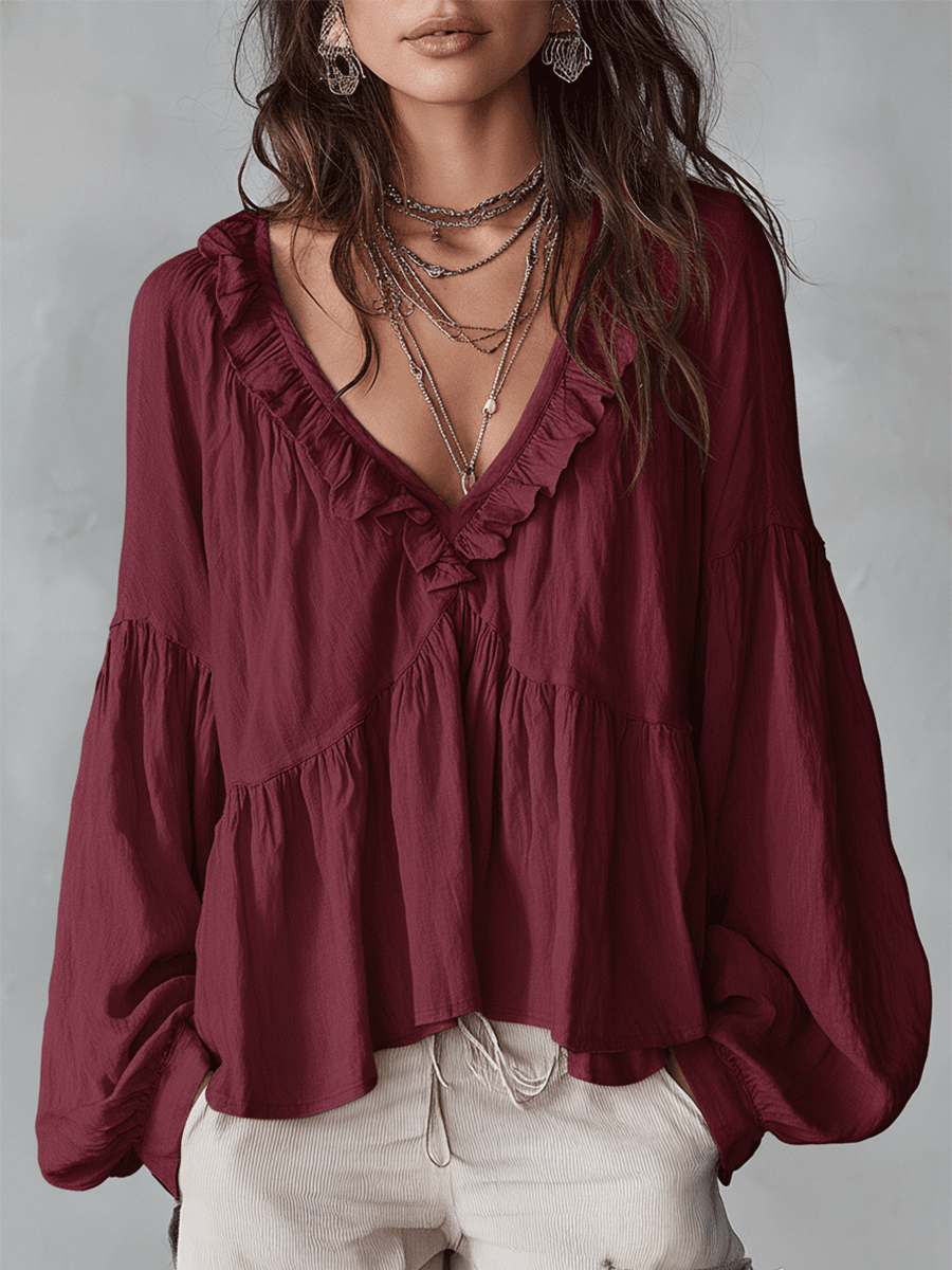 White vintage-inspired blouse with ruffles, perfect for summer. Lightweight and airy design. 7