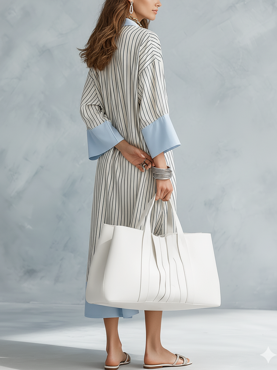 Striped midi dress in soft pastel colors, featuring a tailored fit and breathable fabric for comfort. 5