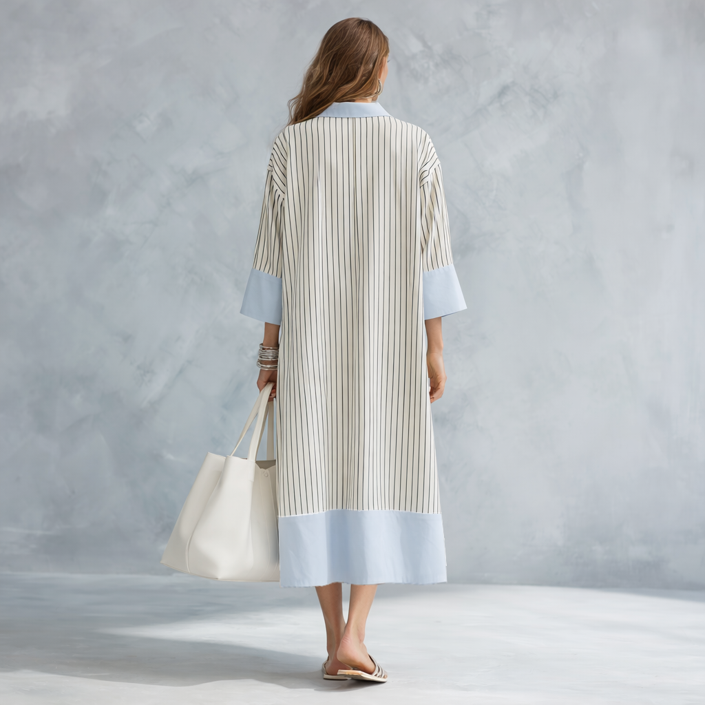 Striped midi dress in soft pastel colors, featuring a tailored fit and breathable fabric for comfort. 7