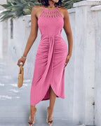 Light blue halter tie summer dress with a criss-cross front and side slit, featuring a knit jacquard pattern. 6