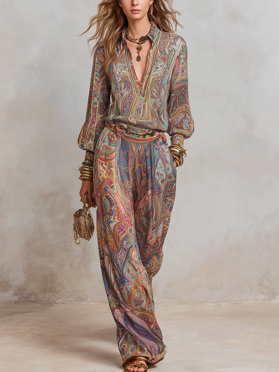 Wide leg pantsuit in navy with a paisley print, featuring a relaxed fit for a comfortable, stylish look. 0