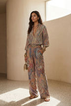Wide leg pantsuit in navy with a paisley print, featuring a relaxed fit for a comfortable, stylish look. 1