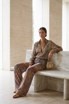 Wide leg pantsuit in navy with a paisley print, featuring a relaxed fit for a comfortable, stylish look. 2