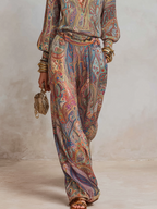 Wide leg pantsuit in navy with a paisley print, featuring a relaxed fit for a comfortable, stylish look. 3