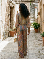 Wide leg pantsuit in navy with a paisley print, featuring a relaxed fit for a comfortable, stylish look. 5
