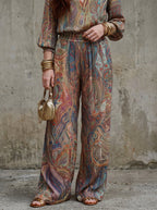 Wide leg pantsuit in navy with a paisley print, featuring a relaxed fit for a comfortable, stylish look. 6