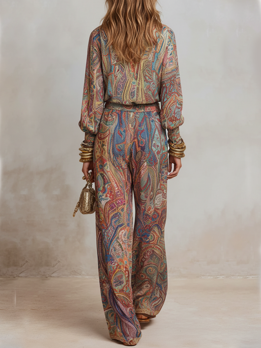 Wide leg pantsuit in navy with a paisley print, featuring a relaxed fit for a comfortable, stylish look. 7