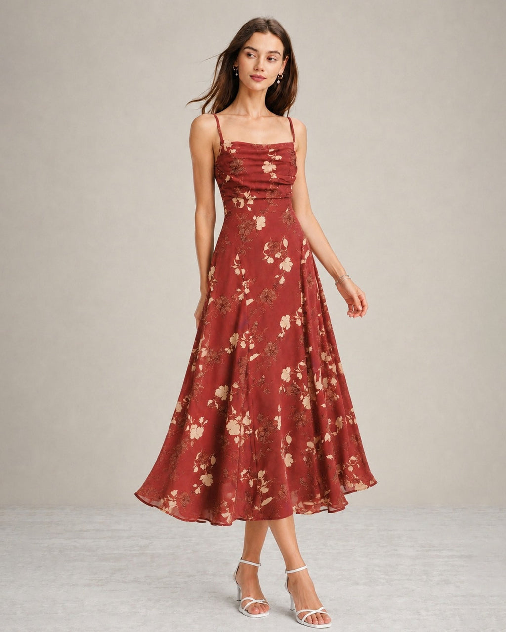 A red floral maxi dress featuring a square neckline and sleeveless design, showcasing a vibrant and feminine style. 3