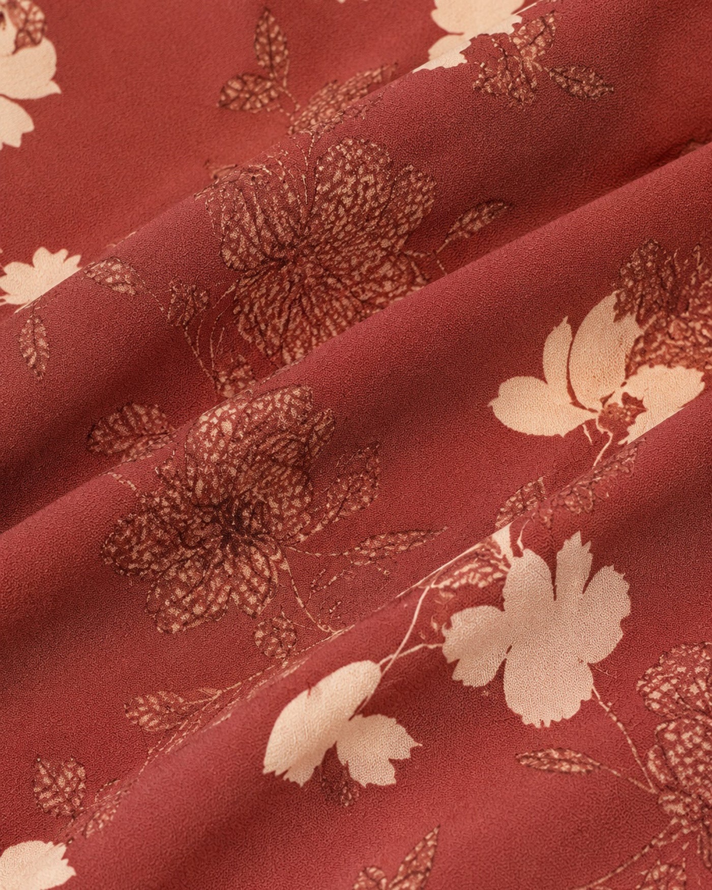 A red floral maxi dress featuring a square neckline and sleeveless design, showcasing a vibrant and feminine style. 5