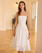 White midi dress with floral jacquard in an A-line silhouette, featuring a classic and elegant style. 2