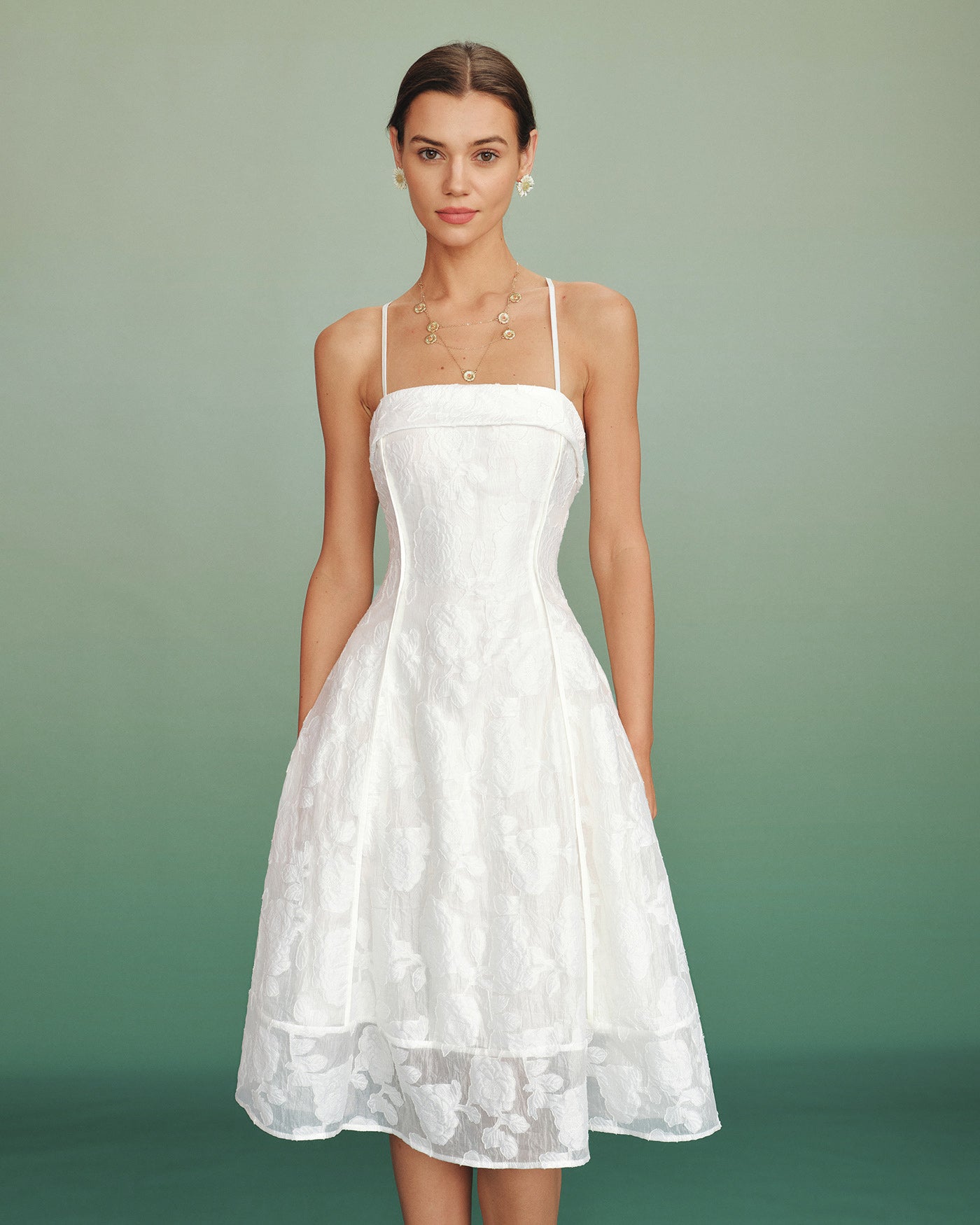 White midi dress with floral jacquard in an A-line silhouette, featuring a classic and elegant style. 3