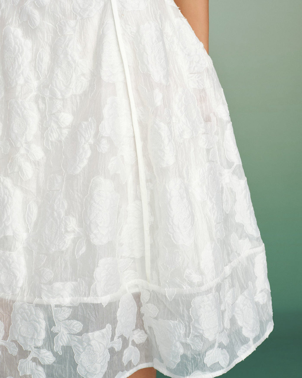 White midi dress with floral jacquard in an A-line silhouette, featuring a classic and elegant style. 4