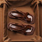 Brown leather cross sandals with a casual style, featuring a simple yet elegant design for everyday wear. 5