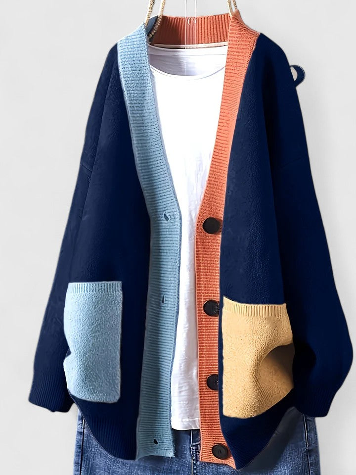 Colour block knit cardigan for women with contrast patch pockets.