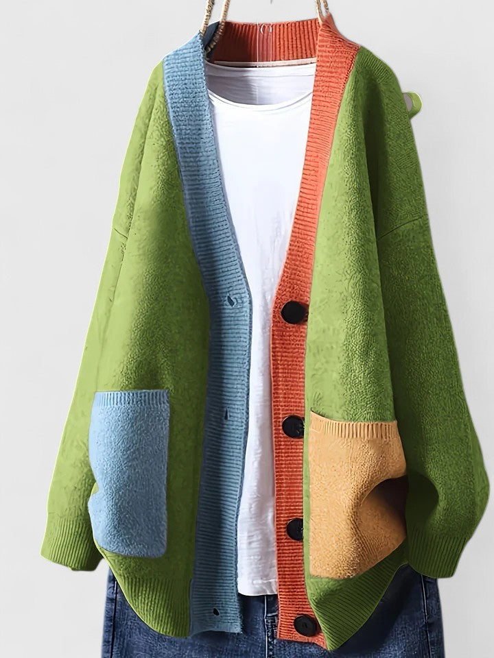 Colour block knit cardigan for women with contrast patch pockets.