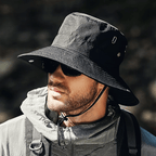 Lightweight beige bucket hat with UPF50+ protection, perfect for outdoor activities and casual wear. 0