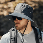 Lightweight beige bucket hat with UPF50+ protection, perfect for outdoor activities and casual wear. 2