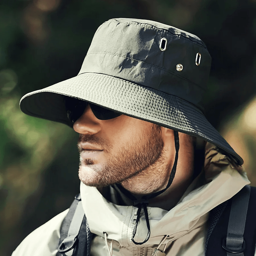 Lightweight beige bucket hat with UPF50+ protection, perfect for outdoor activities and casual wear. 3