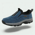 Men's laceless slip-on walking shoes with a chunky lugged grip sole.