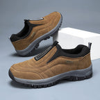 Men's laceless slip-on walking shoes with a chunky lugged grip sole.
