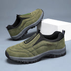 Men's laceless slip-on walking shoes with a chunky lugged grip sole.
