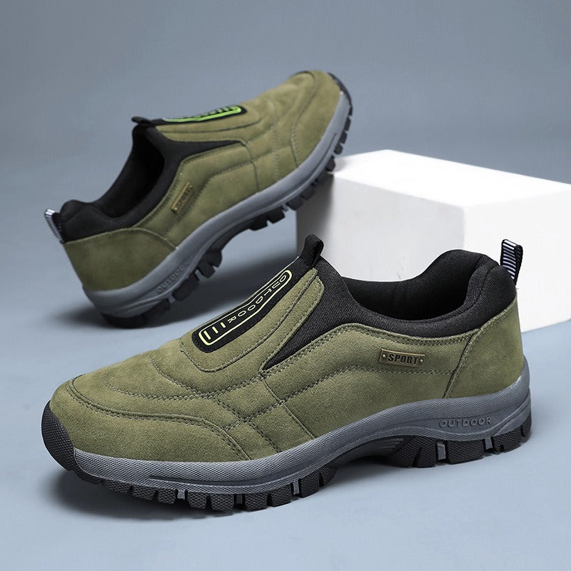 Men's laceless slip-on walking shoes with a chunky lugged grip sole.