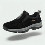 Men's laceless slip-on walking shoes with a chunky lugged grip sole.