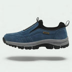 Men's laceless slip-on walking shoes with a chunky lugged grip sole.