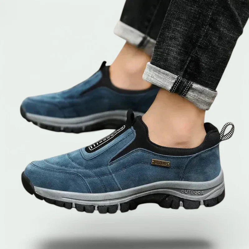 Men's laceless slip-on walking shoes with a chunky lugged grip sole.