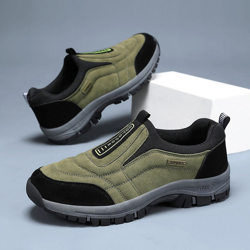 Men's laceless slip-on walking shoes with a chunky lugged grip sole.
