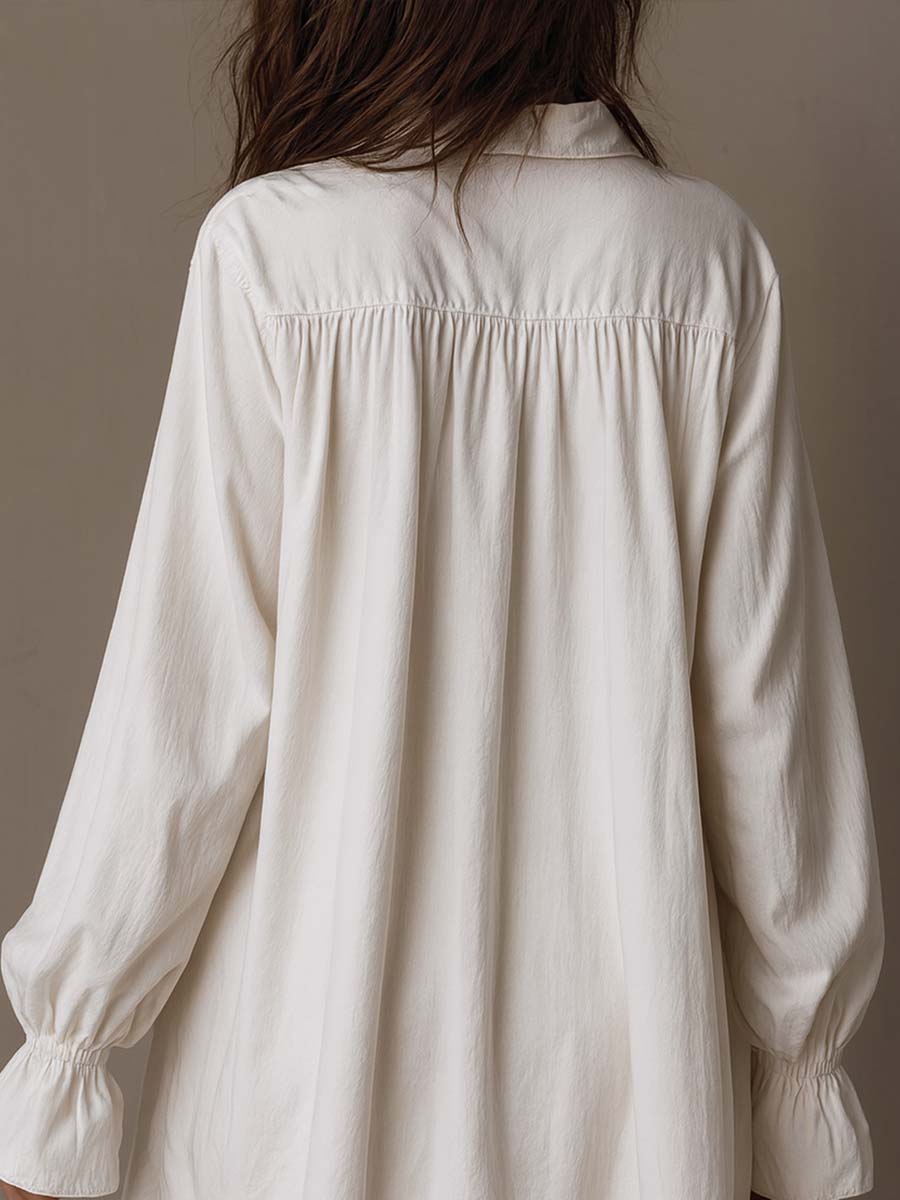 A lavender long-sleeve dress with a retro lace design and an irregular hem. 1