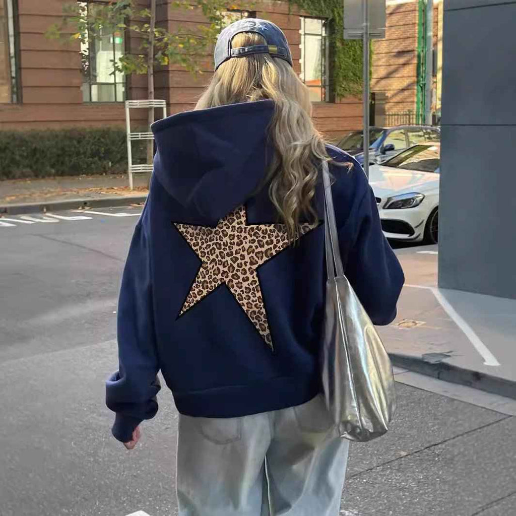 Navy oversized women's hoodie with a large leopard-print star on the back.