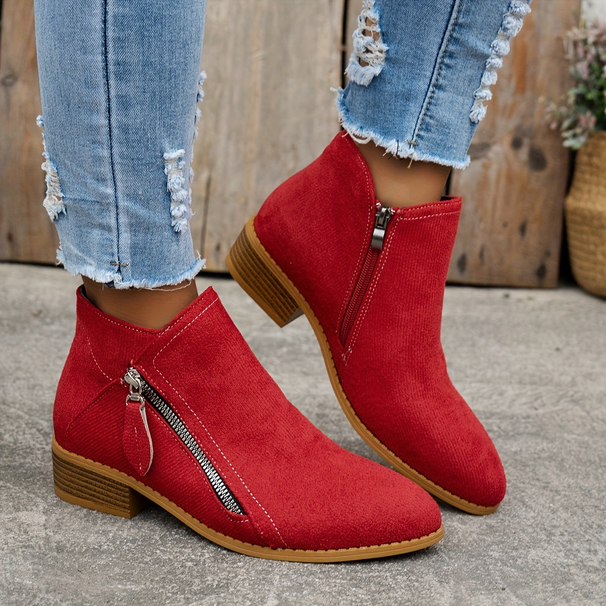 Women's block heel shoes in navy blue, featuring a zip closure and a modern, comfortable design. 10