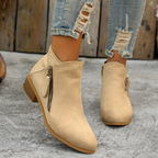 Women's block heel shoes in navy blue, featuring a zip closure and a modern, comfortable design. 12