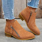Women's block heel shoes in navy blue, featuring a zip closure and a modern, comfortable design. 13