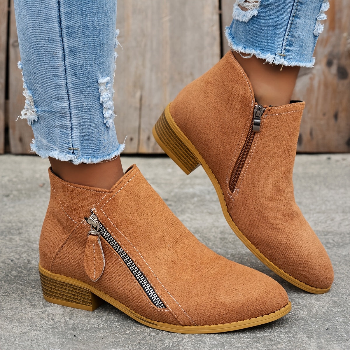 Women's block heel shoes in navy blue, featuring a zip closure and a modern, comfortable design. 13